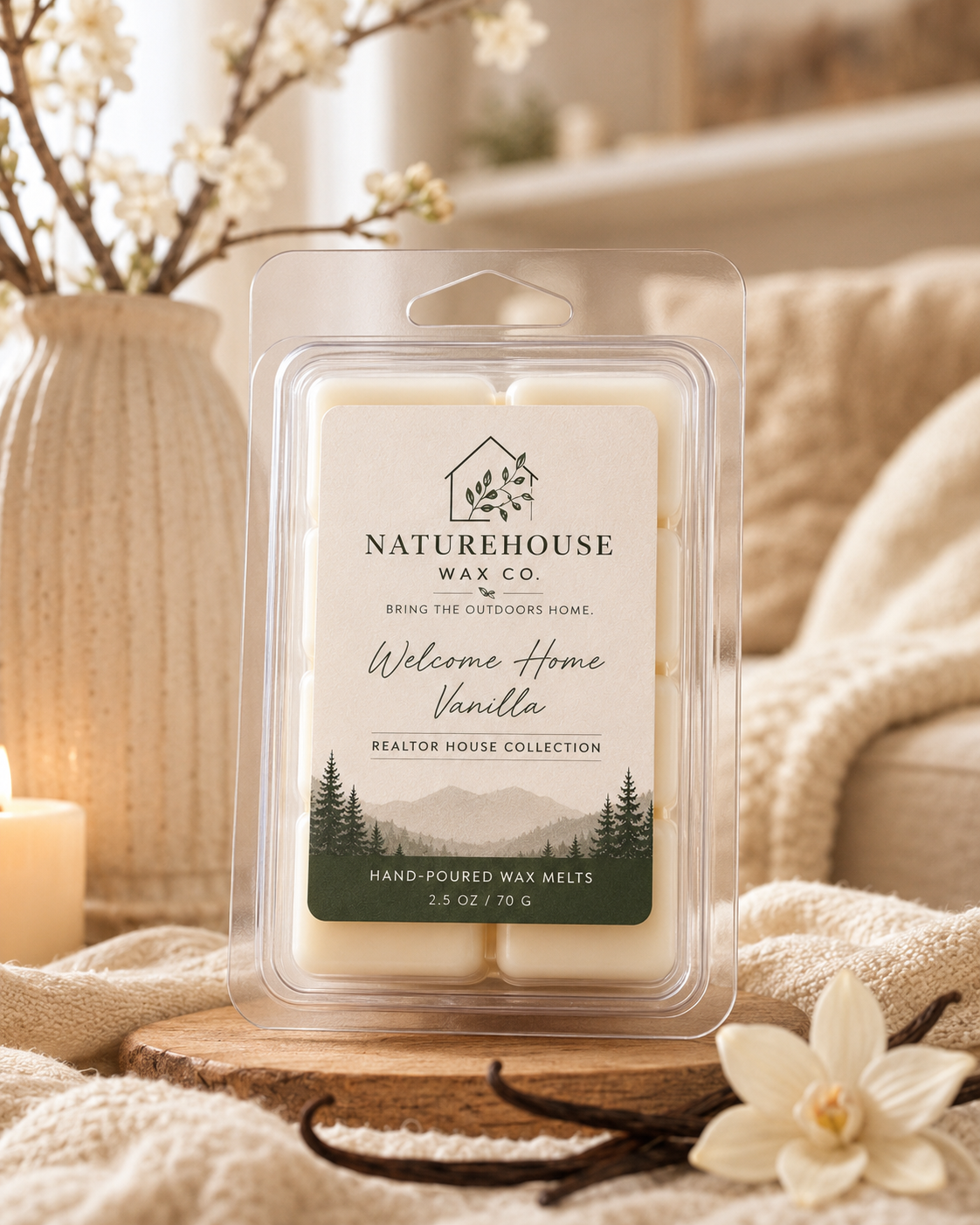 Clear plastic clamshell packaging of Welcome Home Vanilla Wax Melts from Naturehouse Wax Company displayed on a cozy beige knit blanket with vanilla pods and a soft lit candle in a warm, inviting home setting.
